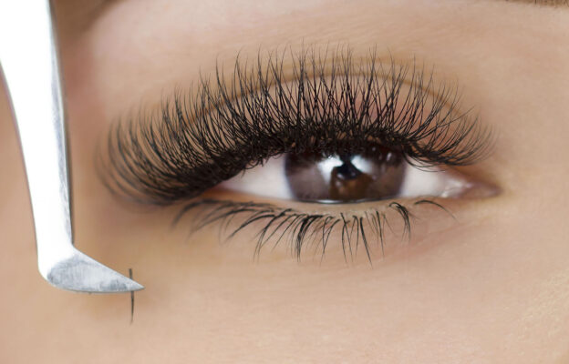 Women wearing natural lash extensions applied by lash techs